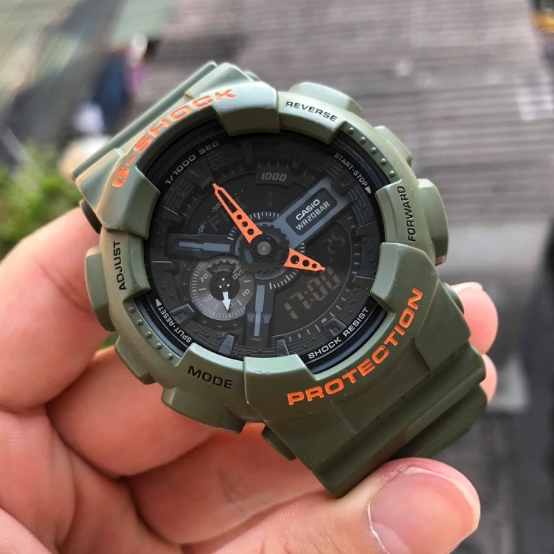 ساعت مچی جی شاک مدل GA110LN-3A سبز لجنی (جیشاک GShock) ، صد در صد ضدآب ، تنظیم اتوماتیک با پایتخت کشورها ، اتولایت دار