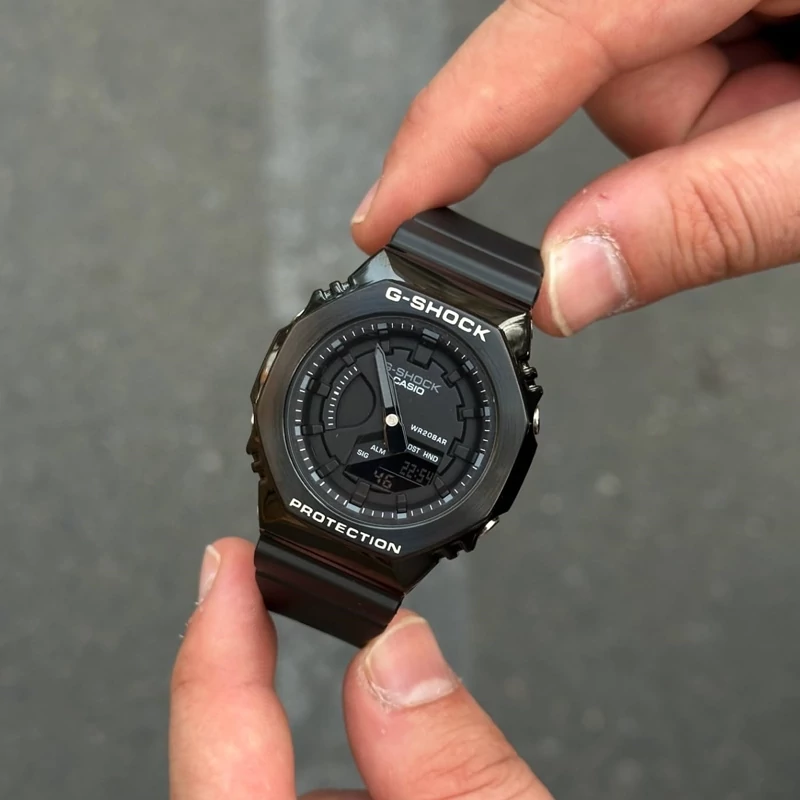 ساعت مچی جی شاک مدل GM-2100 زنانه سایز کوچک(جیشاک GShock) تنظیم اتوماتیک با پایتخت کشورها ،اتولایت اتوماتیک فول مشکی